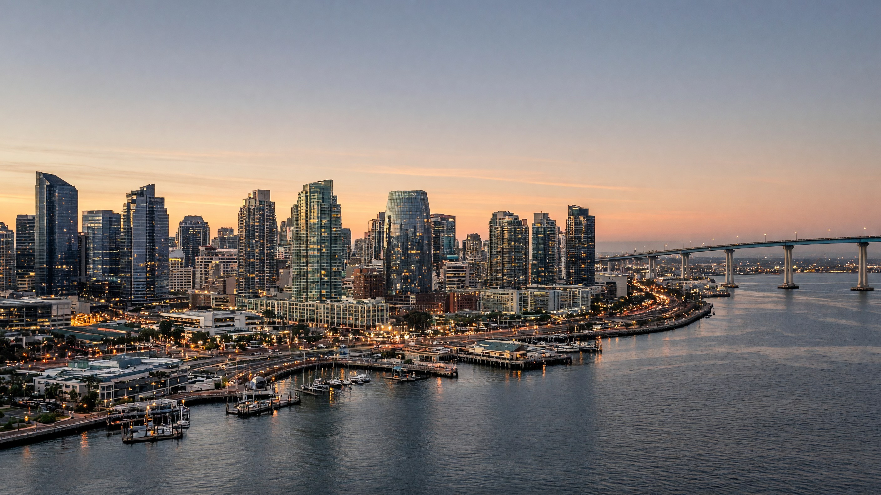 San Diego skyline at dusk, with downtown San Diego waterfront, San Diego Bay, Coronado Bridge